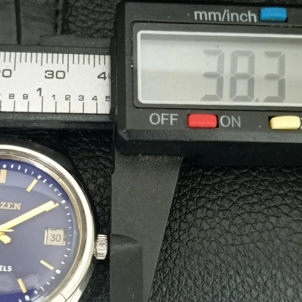 Vintage 1987 Citizen Manual Wound Mens Silver Watch W/Date & Blue accents